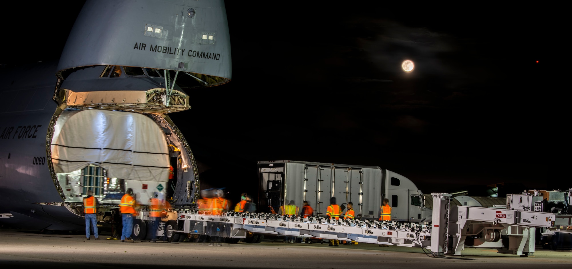 U.S. Air Force Space and Missile Systems Center personnel and civilian ground crews load the fifth Advanced Extremely High Frequency (AEHF-5) communications satellite onto a C-5C Galaxy aircraft, at Sunnyvale, Calif., April 22, 2019. The AEHF constellation is designed to replace the Milstar satellite constellation. (U.S. Air Force Photo by Airman 1st Class Jonathan Carnell)