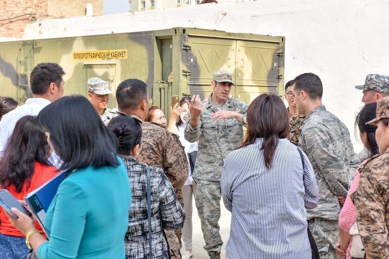 U.S. Air Force Maj. Zachary Gibson, 673rd Medical Operations Squadron emergency physician, discusses medical team’s performance after a mass casualty exercise Aug. 1, 2019, during Pacific Angel 19-3 in Ulaanbaatar, Mongolia. PAC ANGEL is a multilateral humanitarian assistance civil military engagement, improving military-to-military partnerships in the pacific through medical health outreach, civic engineering projects and subject matter expert exchanges between U.S. service members, multinational militaries, nongovernmental organizations, and Mongolian military and civilian participants. (U.S. Air Force photo by Senior Airman Eric M. Fisher)