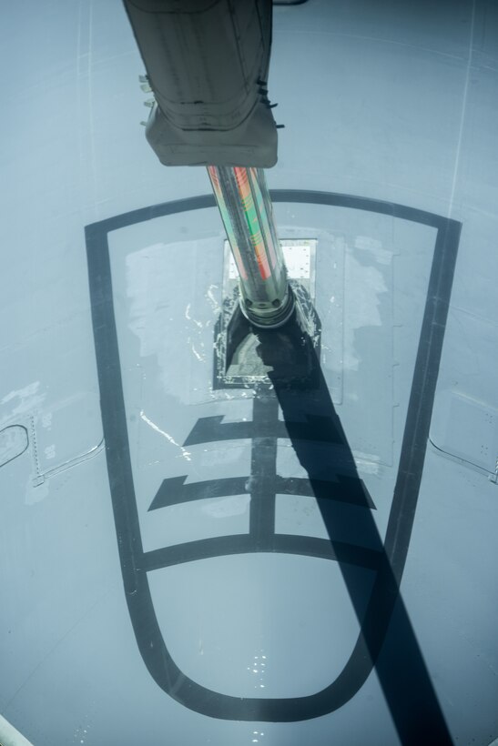 A 908th Expeditionary Air Refueling Squadron KC-10 Extender receives fuel from another KC-10 Aug. 6, 2019. The KC-10 is able to offload and receive fuel to remain airborne longer to support operations throughout the area of operations. (U.S. Air Force photo by Staff Sgt. Chris Thornbury)