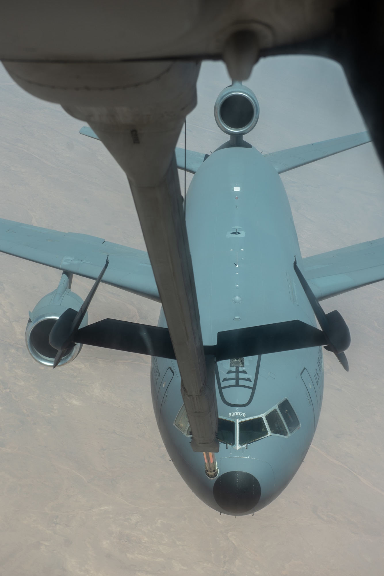 A 908th Expeditionary Air Refueling Squadron KC-10 Extender approaches another KC-10 to receive fuel Aug. 6, 2019. The KC-10 is able to offload and receive fuel to remain airborne longer to support operations throughout the area of operations. (U.S. Air Force photo by Staff Sgt. Chris Thornbury)