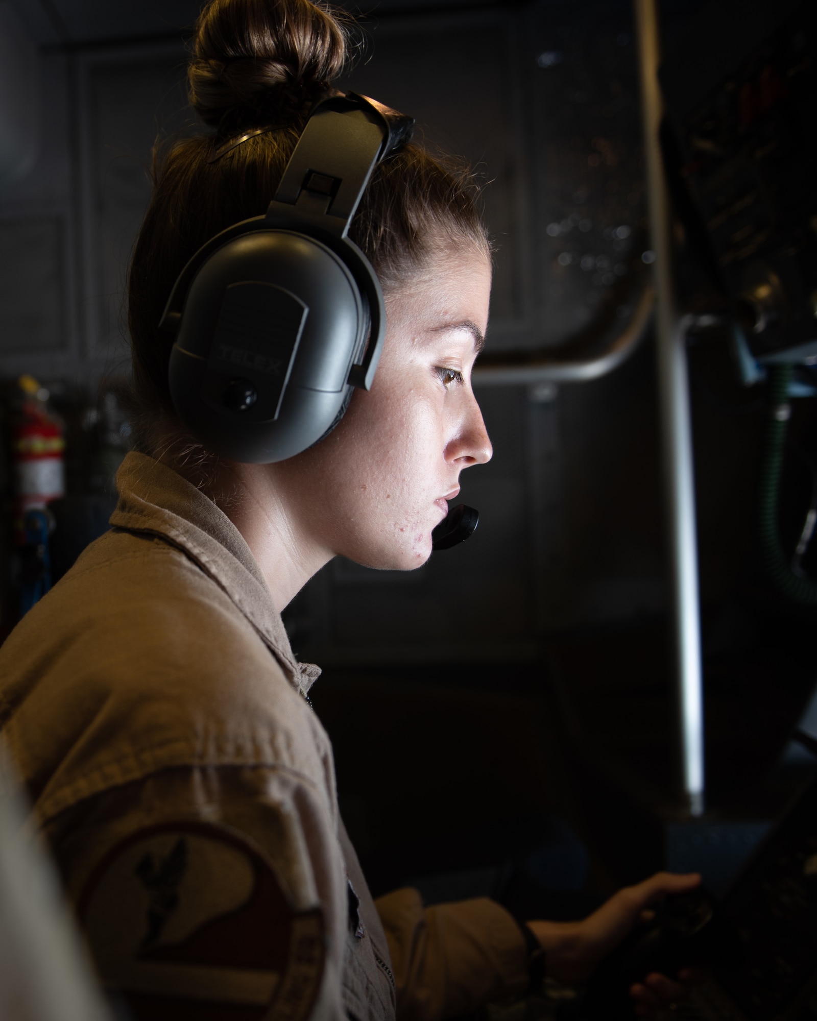 Staff Sgt. Mallory Cook, 908th Expeditionary Air Refueling Squadron KC-10 Extender boom operator, refuels another KC-10 Aug. 6, 2019. Cook offloaded 106,000 pounds of fuel to the KC-10, allowing the other aircrew to bring more fuel to the fight. (U.S. Air Force photo by Staff Sgt. Chris Thornbury)