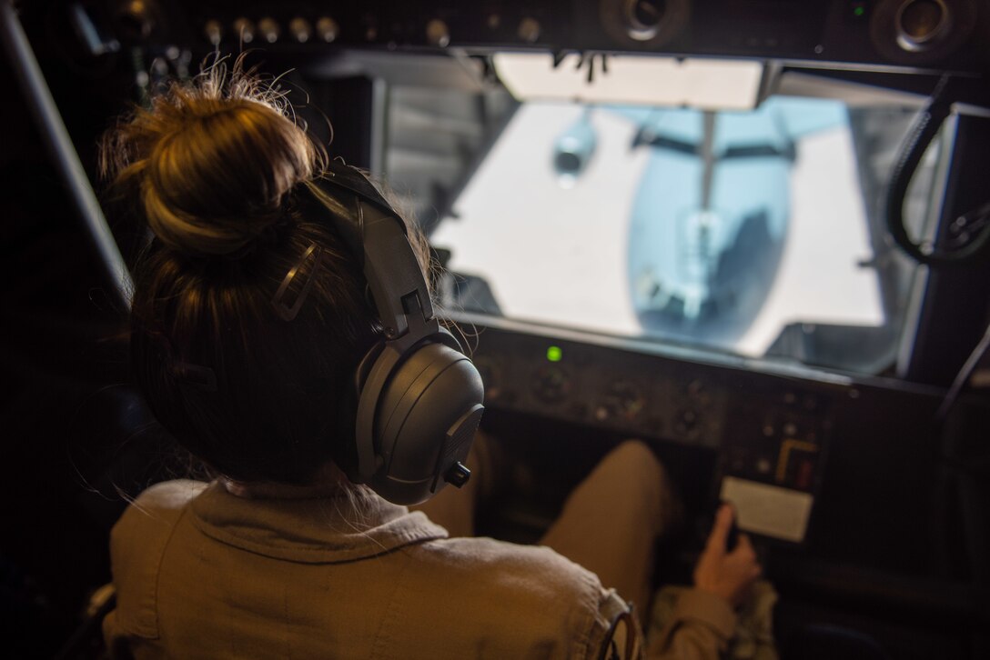 Staff Sgt. Mallory Cook, 908th Expeditionary Air Refueling Squadron KC-10 Extender boom operator, refuels another KC-10 Aug. 6, 2019. Cook offloaded 106,000 pounds of fuel to the KC-10, allowing the other aircrew to bring more fuel to the fight. (U.S. Air Force photo by Staff Sgt. Chris Thornbury)