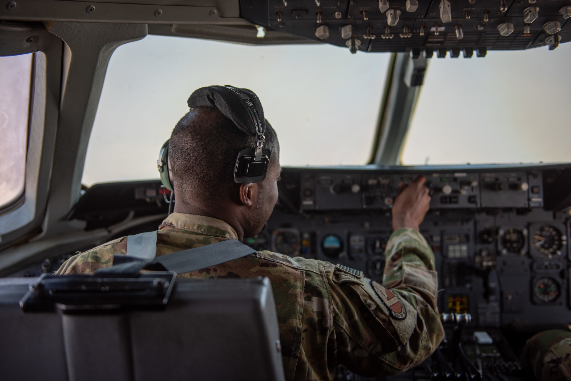 Capt. Chris Tobiere, 908th Expeditionary Air Refueling Squadron KC-10 Extender pilot, manipulates controls during a mission Aug. 6, 2019. During their flight the crew supported exercise Agile Lightning and refueled another KC-10. (U.S. Air Force photo by Staff Sgt. Chris Thornbury)
