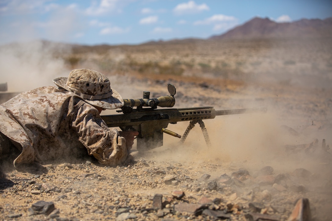 A U.S. Marine with Scout Sniper Platoon, Weapons Company, 1st Battalion, 25th Marine Regiment, 4th Marine Division battle sight zeros a Special Aplication Scoped Rifle, on Twenty-Nine Palms, Calif. July 26, 2019. The Marines of Scout Sniper Platoon executed Know and Unknown Distance ranges in order to prepare themselves for Inegrated Training Exercize 5-19.