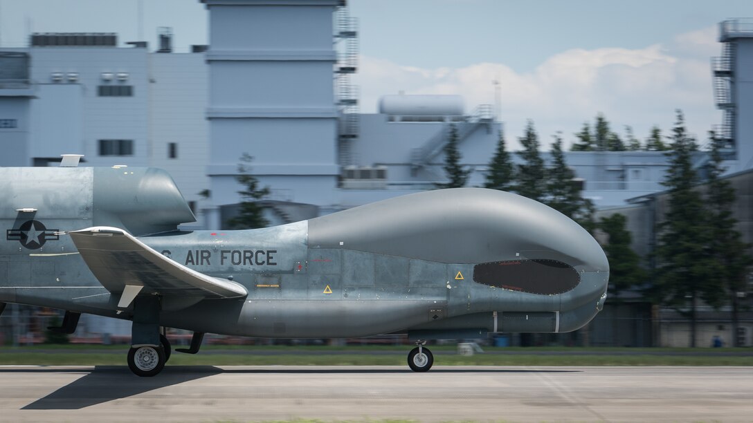 An RQ-4 Global Hawk lands at Yokota Air Base