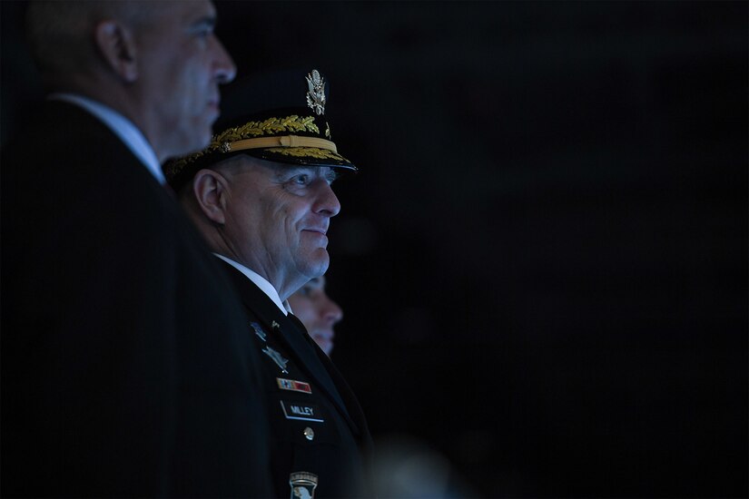 Soldier watches performance.