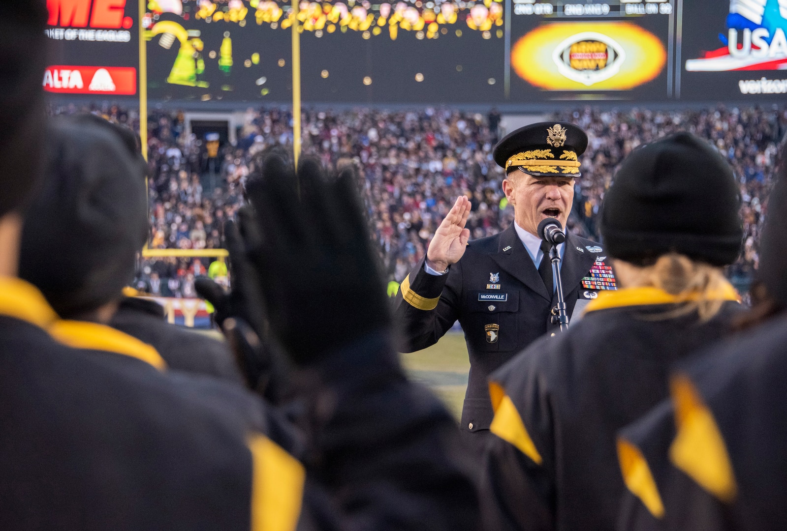 Gen. James McConville, the Army vice chief of staff, swears in recruits during a break in the Army-Navy football game in Philadelphia, Dec. 8, 2018. McConville, who was sworn in as the Army's 40th chief of staff on Aug. 9, 2019, graduated from the U.S. Military Academy in 1981.