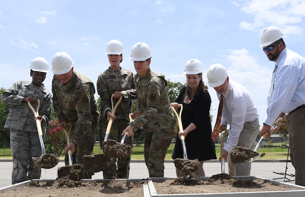 Keesler leadership and project officials participate in a groundbreaking ceremony at the commissary parking lot on Keesler Air Force Base, Mississippi, Aug. 8, 2019. The ceremony introduced the project with NORESCO United Technologies, which will provide 497 solar panels on the exchange and commissary parking lot generating over 2 million kilowatts annually, as well as providing shade and shelter from inclement weather to the parked cars. It is scheduled for completion in May 2021. (U.S. Air Force photo by Kemberly Groue)