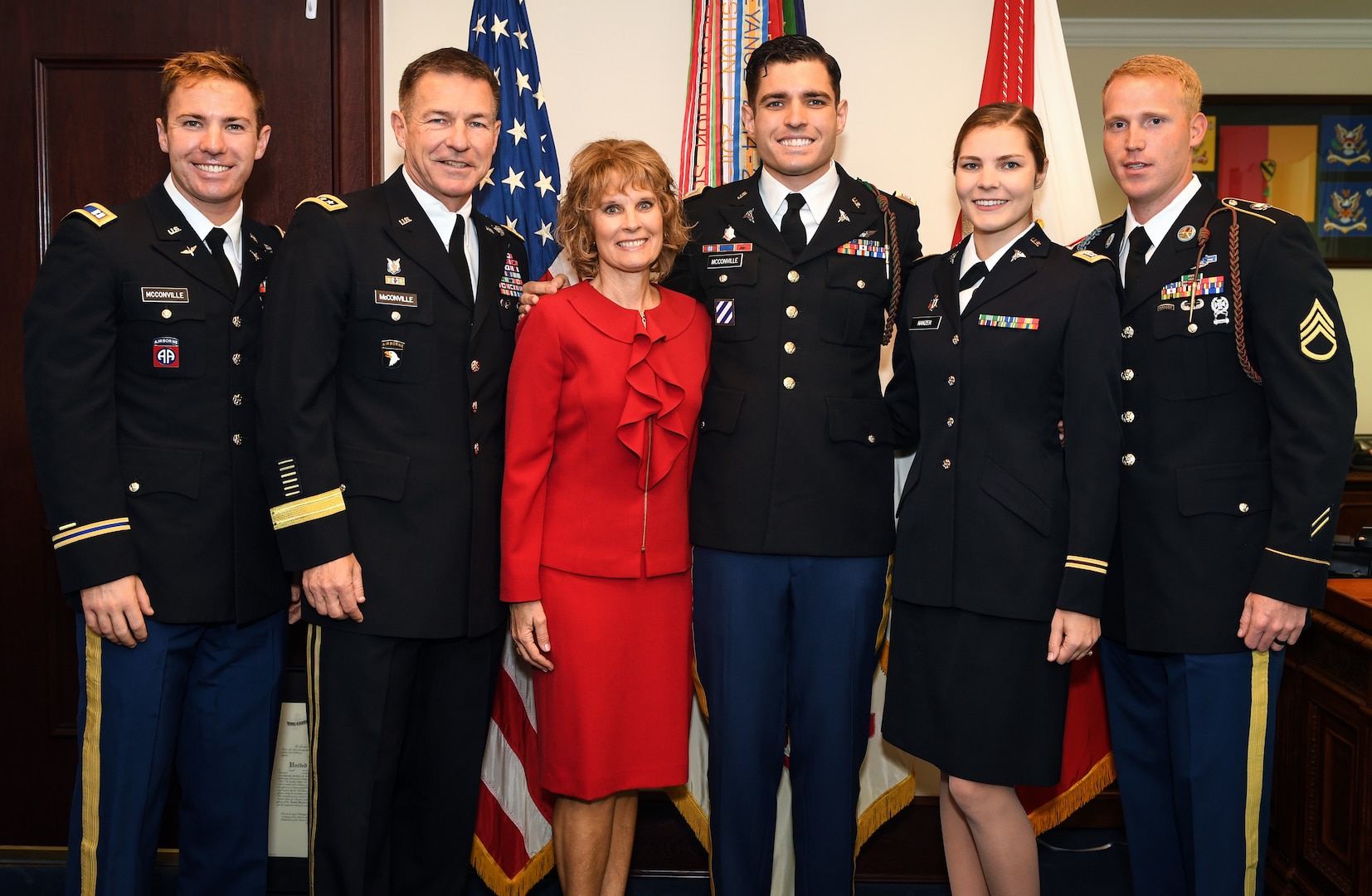 The family of U.S. Army Gen. James C. McConville poses for a photo during a promotion ceremony in honor of his son, Capt. Ryan McConville, in his office at the Pentagon in Arlington, Virginia, May 2, 2019.