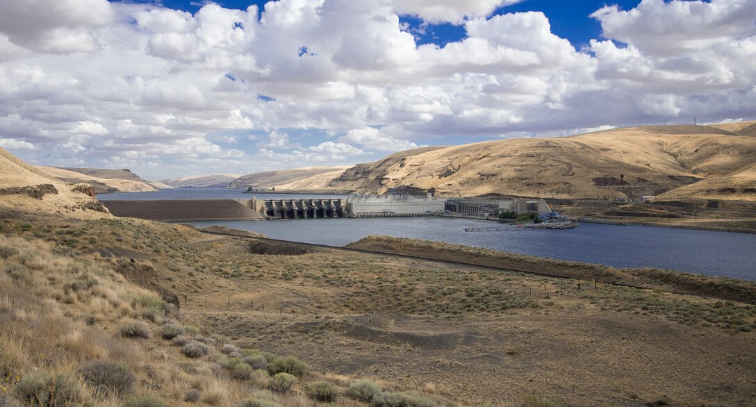 Little Goose construction started in June 1963. The filling of Lake Bryan began on Feb.16, 1970, and continued until elevation 638 feet was reached on Feb. 25, 1970. The dam is 2,655 feet long with an effective height of about 100 feet. It is located on the Snake River near Starbuck, Wash., and upstream of Lake West, the reservoir formed by Lower Monumental Dam. It is a concrete gravity dam with an earthfill abutment embankment. It includes a navigation lock and eightbay spillway 512 feet long, which has eight 50 feet by 60 feet tainter gates. The installation of power generating units one through three was completed, and the first unit began producing power in March 1970. Additional power units four through six were installed and power for those units came online in July 1978. Revisions were made to the juvenile fish facility in 1982 and 1984.