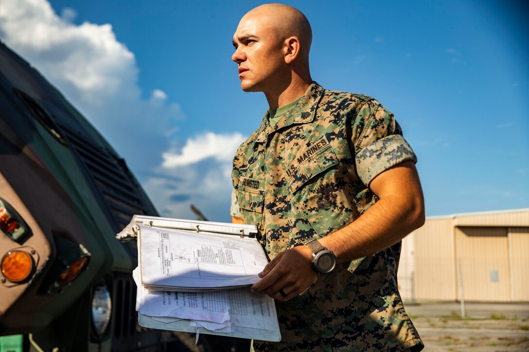Sgt. Cole A. Bumsted, a motor transport operator with Motor Transport Company, Marine Wing Support Squadron 271, Marine Wing Support Group 27, poses for a photo at Marine Corps Air Station Cherry Point, N.C., Aug. 8, 2019. "Noncommissioned officers are never tired, hungry or sleepy," said Bumsted, a Montgomery, Iowa native. According to his leadership, Bumsted is extremely enthusiastic about his military occupational specialty and displays the embodiment of honor, courage and commitment with each and every action. He leads by example in his daily routine and demands a high performance level for himself. Bumsted's selfless acts demonstrate the qualities of a leader that every Marine should emulate. (U.S. Marine Corps photo by Gavin Umboh)