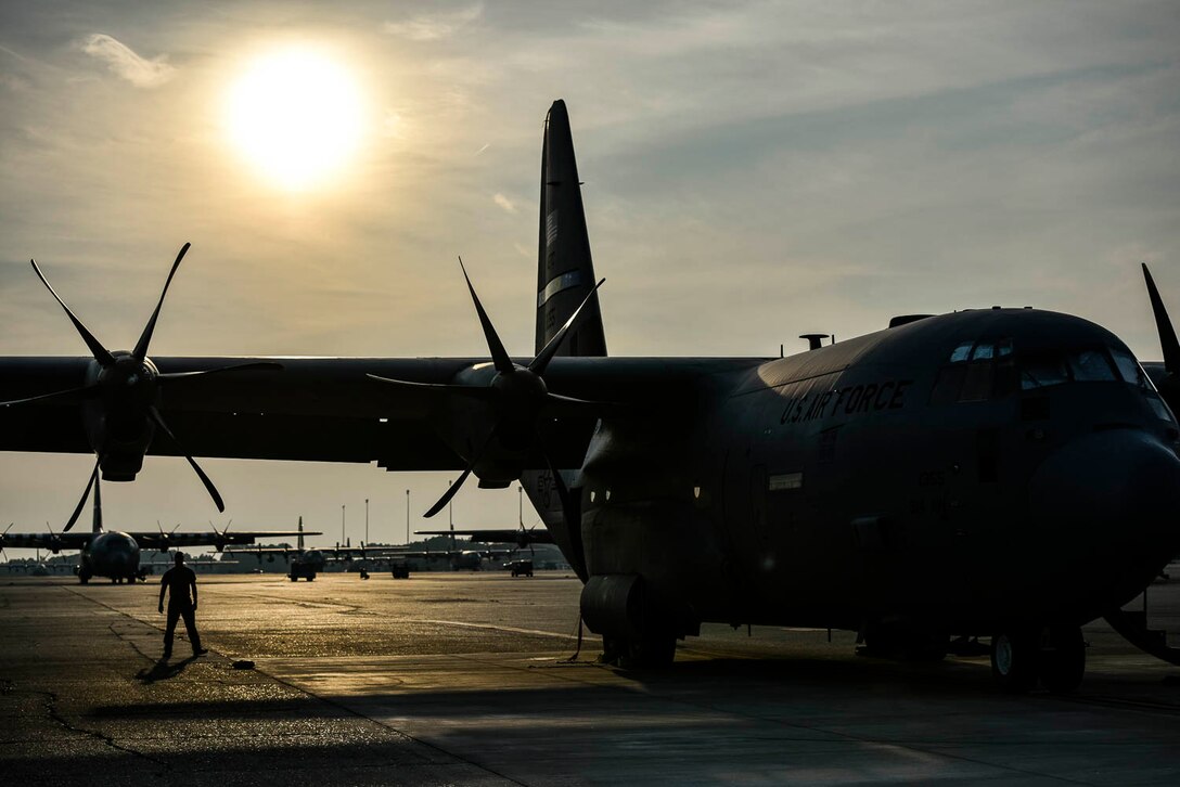 Tech. Sgt. William Mcleod, 327th Airlift Squadron loadmaster, conducts pre-flight checks before take-off as part of the Turkey Shoot competition August 7, 2019, at Little Rock Air Force Base, Ark. The Turkey Shoot is a multi-event test which evaluates all aspects of combat airlift such as threat mitigation, container delivery system airdrops, assault landings and loading and offloading vehicles. The majority of our Reserve members must meet the same requirements of Active Duty personnel. This entails balancing a fulltime civilian job or college studies while maintaining their military readiness. (U.S. Air Force Reserve photo by Senior Airman Nathan Byrnes)