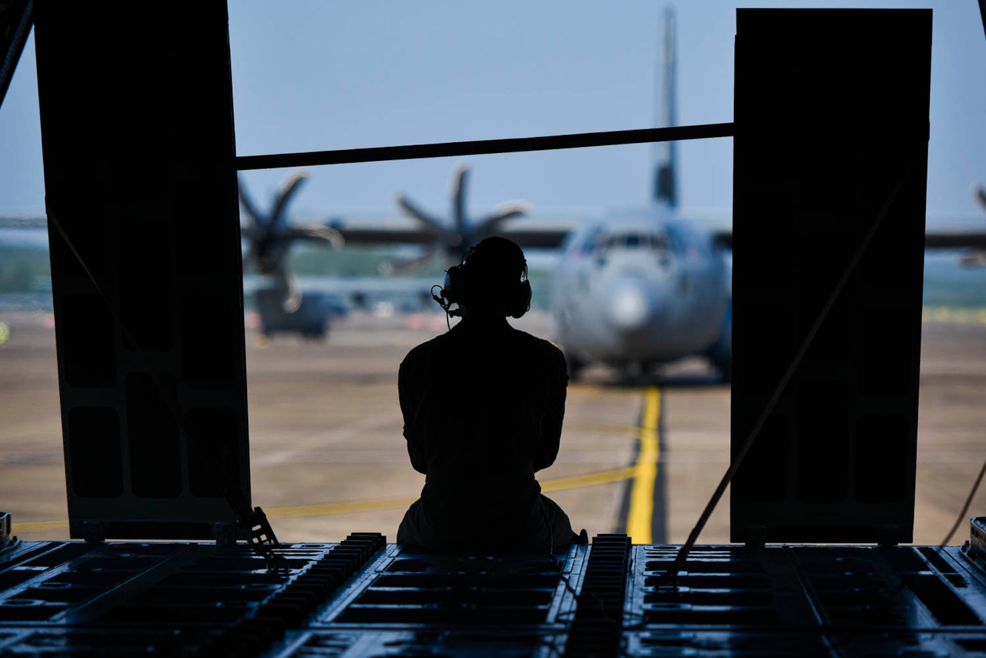 Tech. Sgt. William Mcleod, 327th Airlift Squadron loadmaster, conducts pre-flight checks before take-off as part of the Turkey Shoot competition August 7, 2019, at Little Rock Air Force Base, Ark. The Turkey Shoot is a multi-event test which evaluates all aspects of combat airlift such as threat mitigation, container delivery system airdrops, assault landings and loading and offloading vehicles. The majority of our Reserve members must meet the same requirements of Active Duty personnel. This entails balancing a fulltime civilian job or college studies while maintaining their military readiness. (U.S. Air Force Reserve photo by Senior Airman Nathan Byrnes)