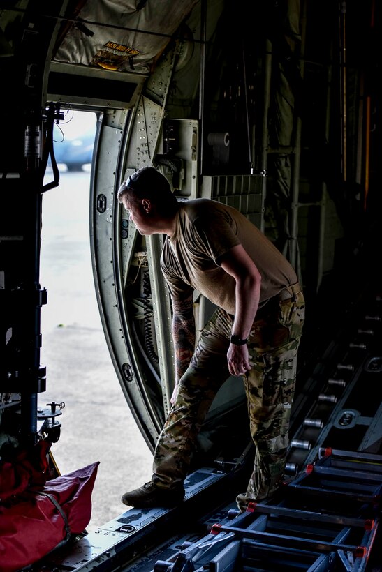 Tech. Sgt. William Mcleod, 327th Airlift Squadron loadmaster, conducts pre-flight checks before take-off as part of the Turkey Shoot competition August 7, 2019, at Little Rock Air Force Base, Ark. The Turkey Shoot is a multi-event test which evaluates all aspects of combat airlift such as threat mitigation, container delivery system airdrops, assault landings and loading and offloading vehicles. The majority of our Reserve members must meet the same requirements of Active Duty personnel. This entails balancing a fulltime civilian job or college studies while maintaining their military readiness. (U.S. Air Force Reserve photo by Senior Airman Nathan Byrnes)