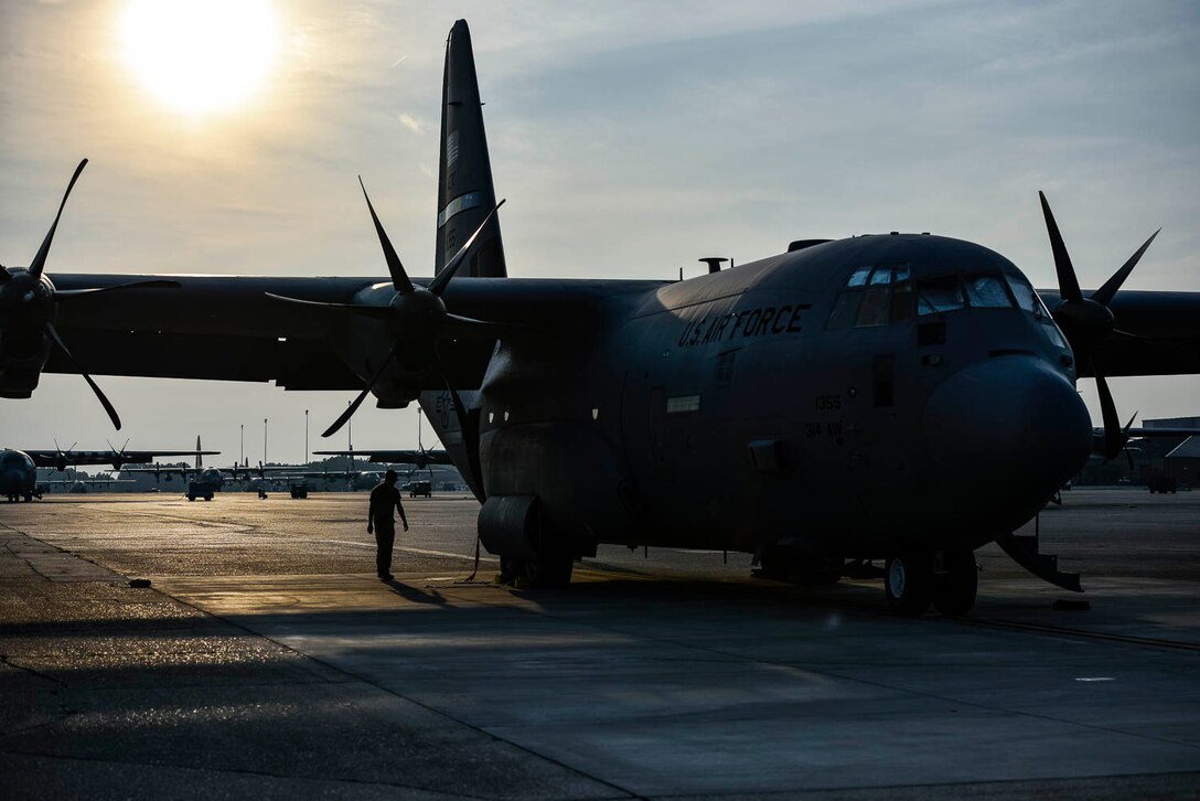Tech. Sgt. William Mcleod, 327th Airlift Squadron loadmaster, conducts pre-flight checks before take-off as part of the Turkey Shoot competition August 7, 2019, at Little Rock Air Force Base, Ark. The Turkey Shoot is a multi-event test which evaluates all aspects of combat airlift such as threat mitigation, container delivery system airdrops, assault landings and loading and offloading vehicles. The majority of our Reserve members must meet the same requirements of Active Duty personnel. This entails balancing a fulltime civilian job or college studies while maintaining their military readiness. (U.S. Air Force Reserve photo by Senior Airman Nathan Byrnes)
