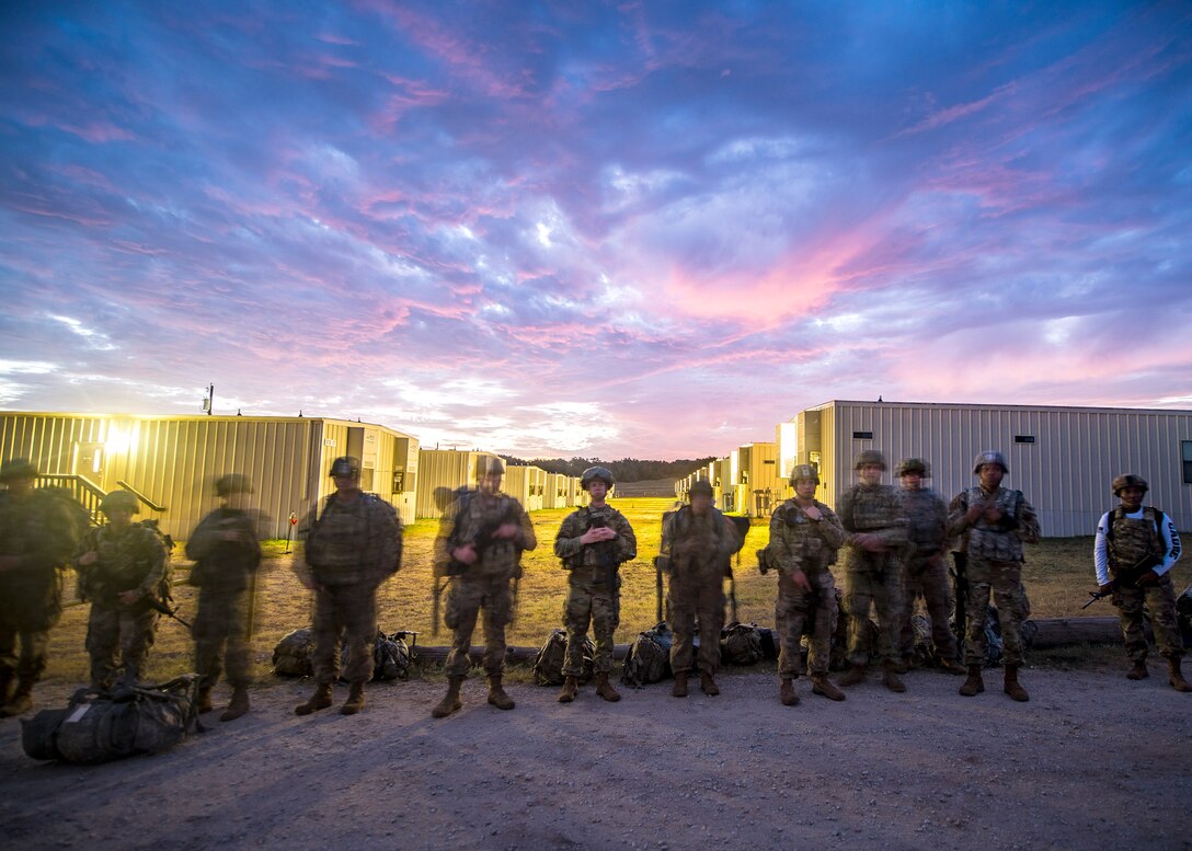 Airmen stand in formation prior to a briefing during a certification field exercise (CFX), July 29, 2019, at Camp Bowie Training Center, Texas. The CFX was designed to evaluate the squadron’s overall tactical ability and readiness to provide the U.S. Army with full spectrum environmental support to the Joint Task Force (JTF) fight. (U.S. Air Force photo by Airman 1st Class Eugene Oliver)