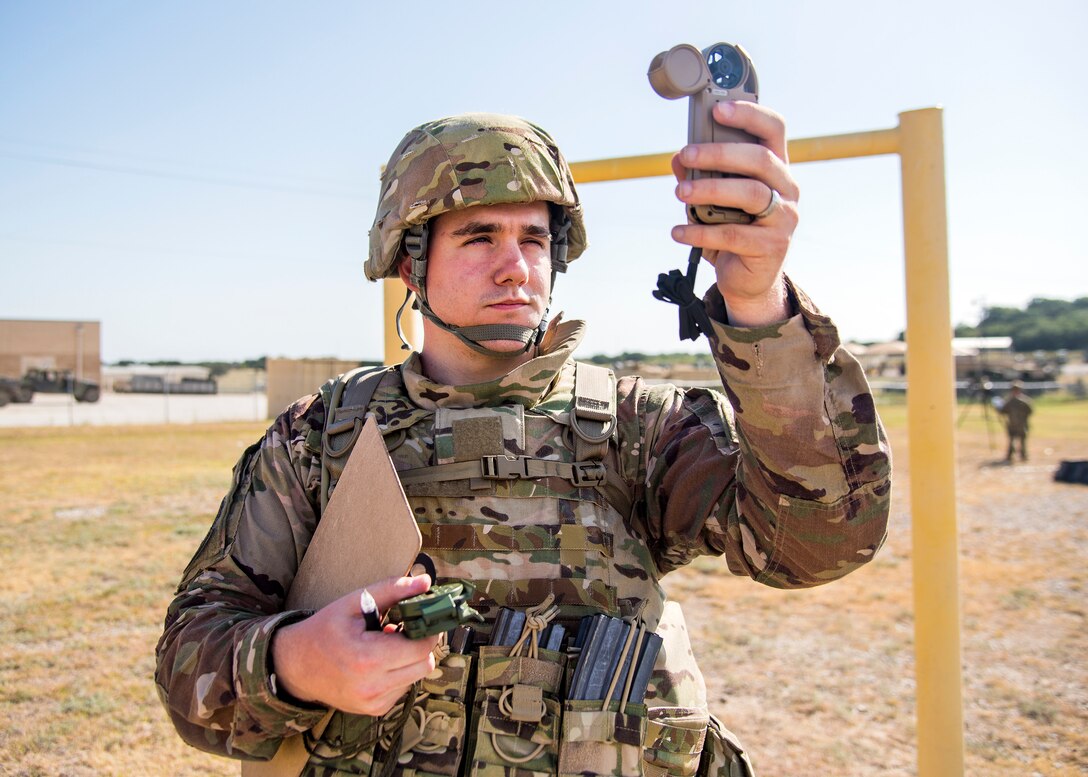 Senior Airman Robert Terry, 3d Weather Squadron (WS) weather forecaster, reads a kestrel meter during a certification field exercise (CFX), July 29, 2019, at Camp Bowie Training Center, Texas. The CFX was designed to evaluate the squadron’s overall tactical ability and readiness to provide the U.S. Army with full spectrum environmental support to the Joint Task Force (JTF) fight. While deployed, the Army relies on the 3d WS to provide them with current ground weather reports. These reports are then employed by commanders on the ground as they plan the best tactics and approaches to accomplish the mission. (U.S. Air Force photo by Airman 1st Class Eugene Oliver)