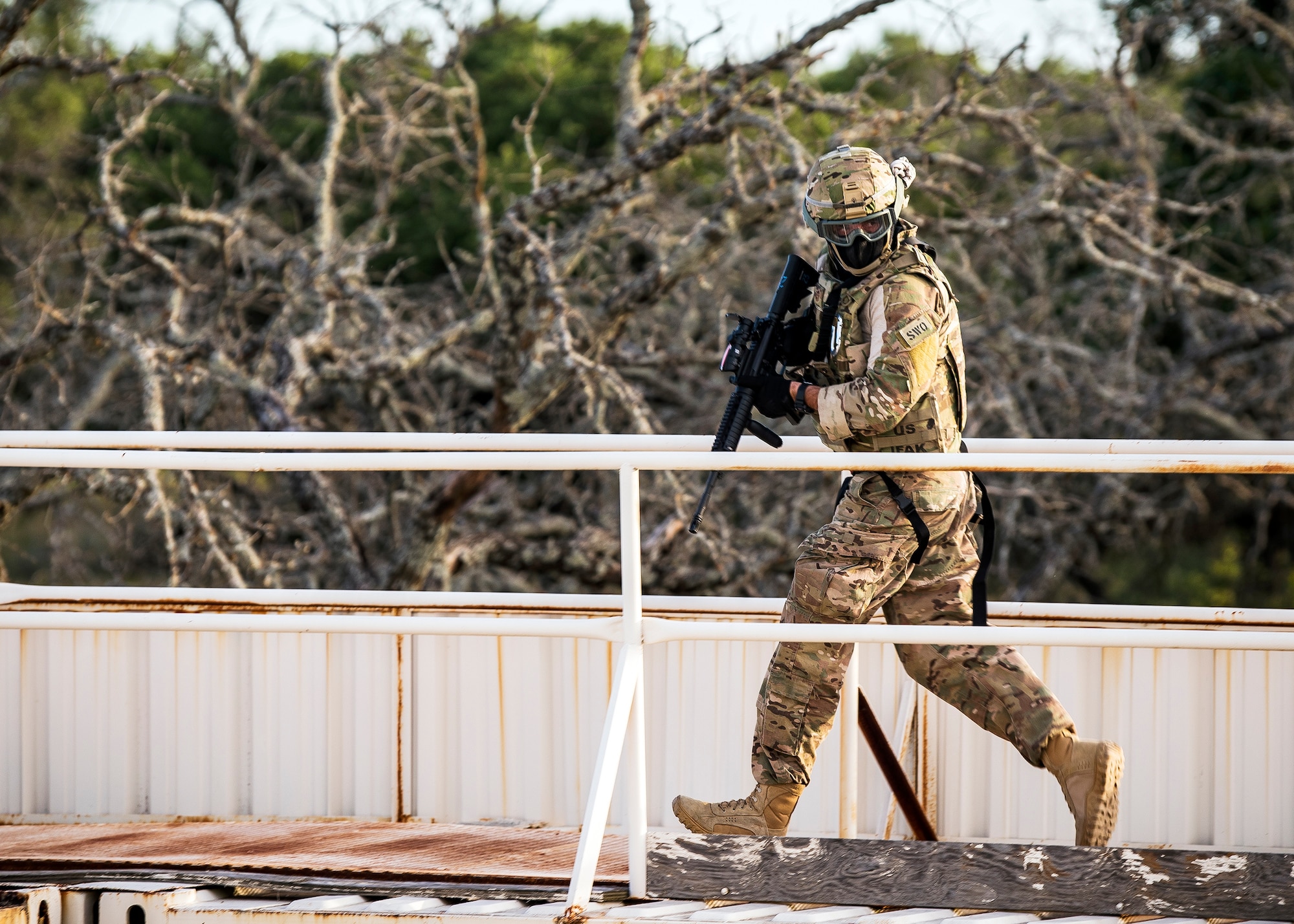 A Staff Weather Officer from the 3d Weather runs to another vantage point during a certification field exercise (CFX), July 29, 2019, at Camp Bowie Training Center, Texas. The CFX was designed to evaluate the squadron’s overall tactical ability and readiness to provide the U.S. Army with full spectrum environmental support to the Joint Task Force (JTF) fight. The CFX immersed Airmen into all the aspects of what could come with a deployment such as force on force scenarios. (U.S. Air Force photo by Airman 1st Class Eugene Oliver)