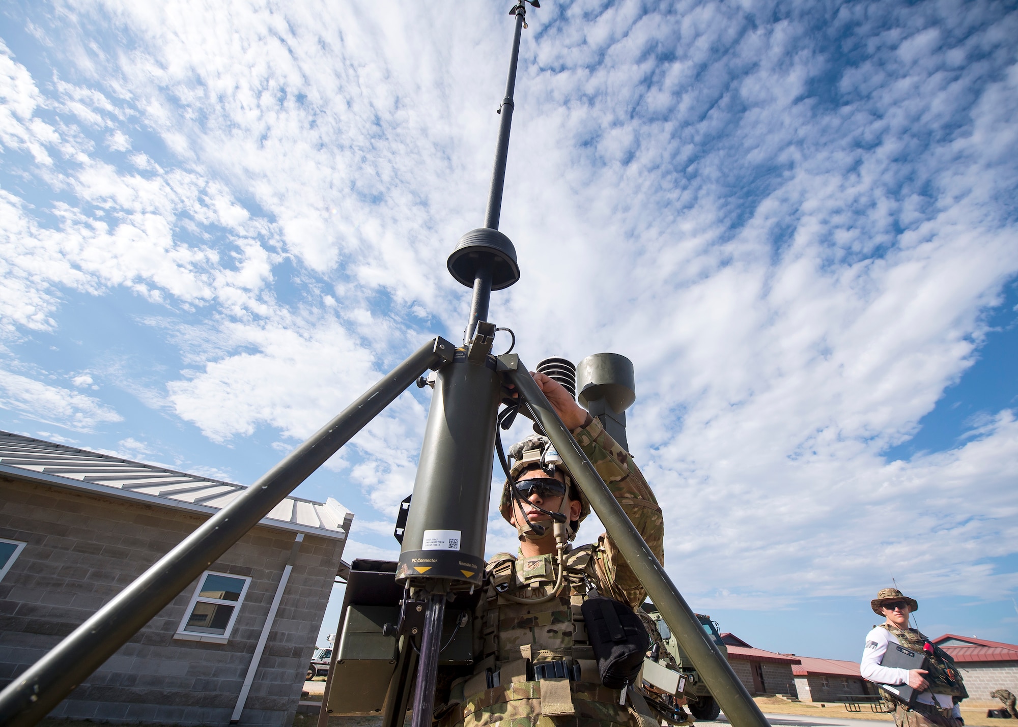 Senior Airman Isidro Sablan, 3d Weather Squadron (WS) weather forecaster, assembles a tactical meteorological observing system during a certification field exercise (CFX), July 29, 2019, at Camp Bowie Training Center, Texas. The CFX was designed to evaluate the squadron’s overall tactical ability and readiness to provide the U.S. Army with full spectrum environmental support to the Joint Task Force (JTF) fight. While deployed, the Army relies on the 3d WS to provide them with current ground weather reports. These reports are then employed by commanders on the ground as they plan the best tactics and approaches to accomplish the mission. (U.S. Air Force photo by Airman 1st Class Eugene Oliver)