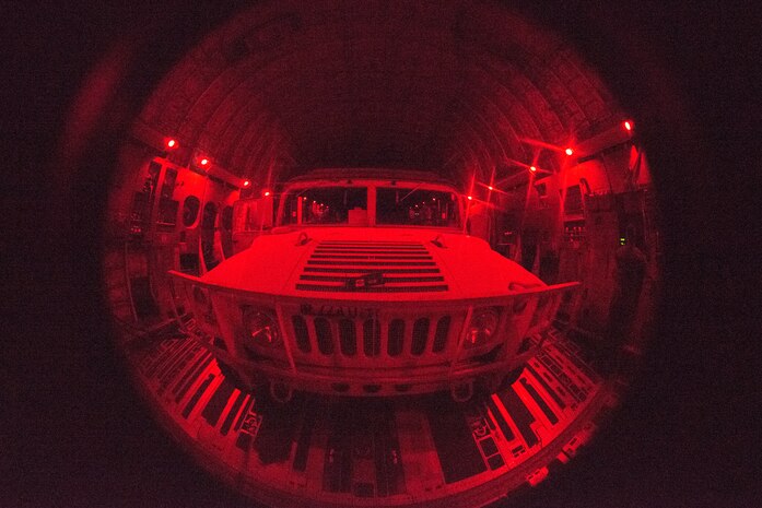 A U.S. Army Humvee sits on the cargo bay of a C-17 Globemaster III, assigned to the 437th Airlift Wing, as part of Exercise Dragon Lifeline August 8, 2019, above South Carolina. The deployment readiness exercise combined the capabilities of service members from Fort Bragg, N.C., Joint Base Charleston, S.C., and Joint Base Langley-Eustis, Va., focused on the rapid deployment of equipment, vehicles and personnel. Participants shared knowledge and tested their efficiency in moving assets by air, land, rail and sea during the training event. The annual exercise is just one of the critical readiness exercises the DOD conducts to maintain a lethal and ready force. (U.S. Air Force photo by Staff Sgt. Tenley Long)