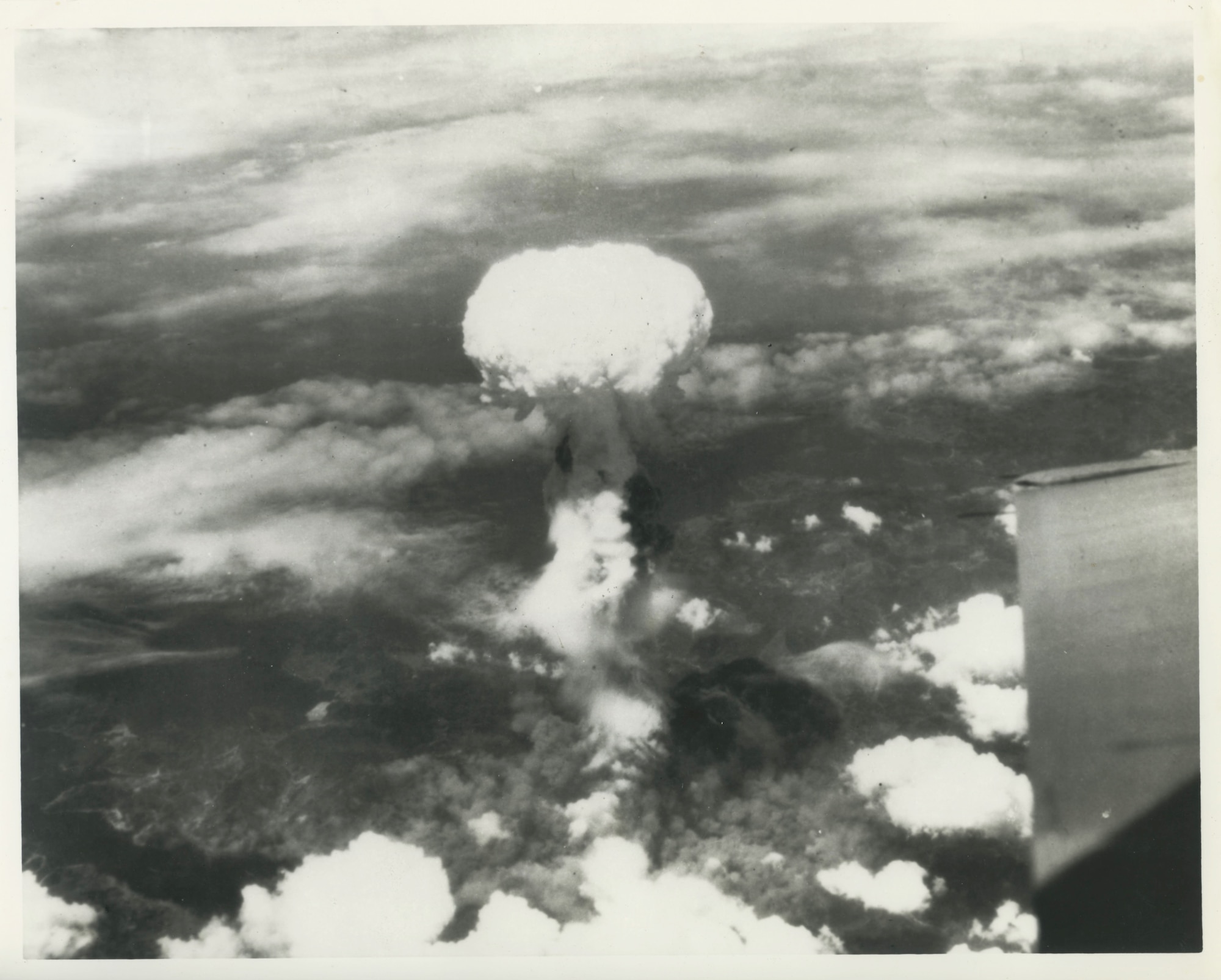The mushroom cloud blooms after the 509th Composite Group dropped the atomic bomb nicknamed "Fat Boy" on August 9, 1945, over Nagasaki, Japan. (Courtesy photo)