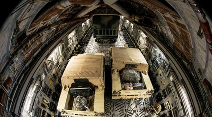 U.S. Army Soldiers and U.S. Air Force Airmen conduct aerial operations during Exercise Dragon Lifeline August 8, 2019, above South Carolina. The deployment readiness exercise combined the capabilities of service members from Fort Bragg, N.C., Joint Base Charleston, S.C., and Joint Base Langley-Eustis, Va., and focused on the rapid deployment of equipment, vehicles and personnel. Participants shared knowledge and tested their efficiency in moving assets by air, land, rail and sea during the training event. The annual exercise is just one of the critical readiness exercises the DOD conducts to maintain a lethal and ready force. (U.S. Air Force photo by Staff Sgt. Tenley Long)