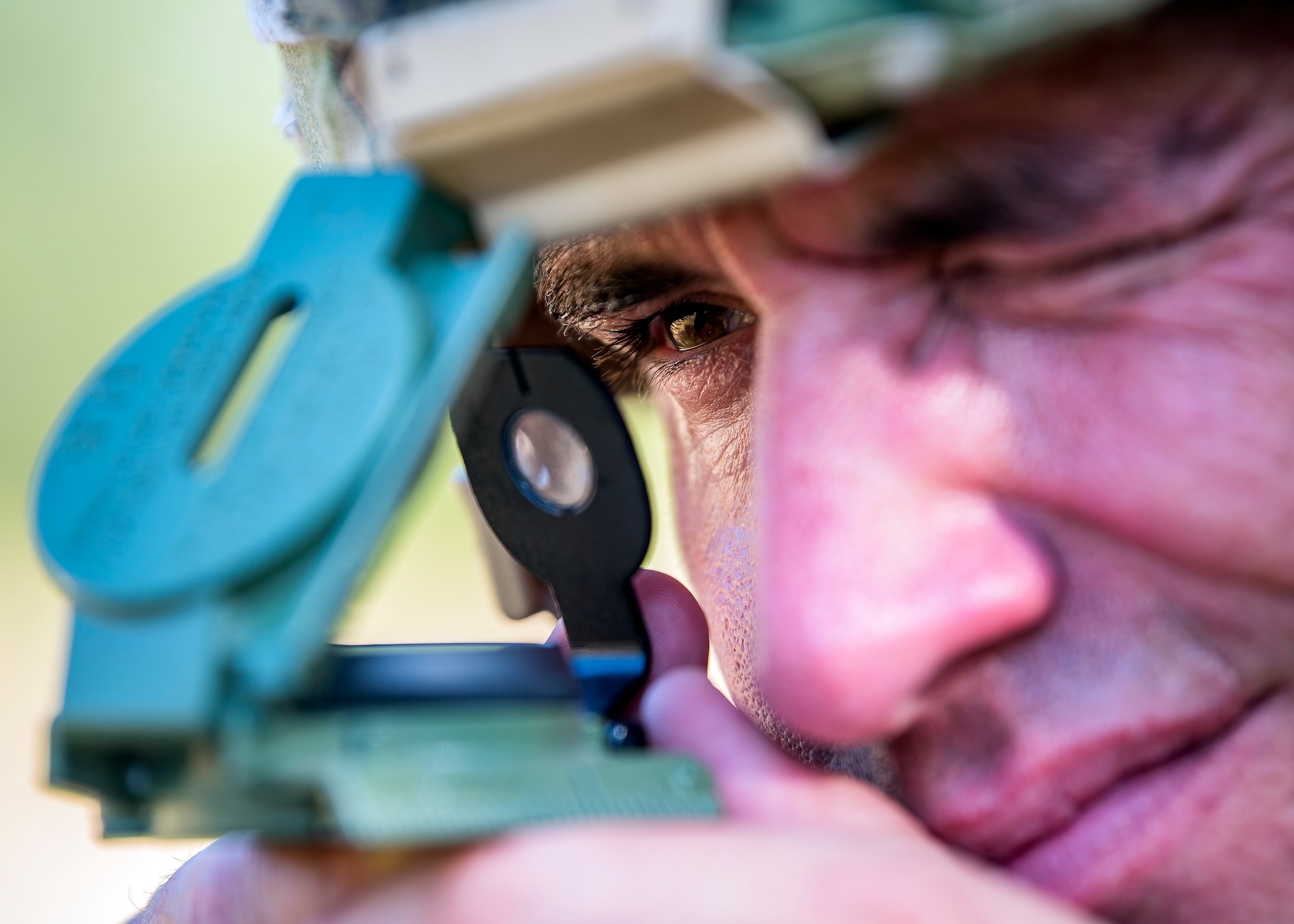 Master Sgt. James Kamphaus, 3d Weather Squadron mission support flight chief, reads a compass during a certification field exercise (CFX), July 31, 2019, at Camp Bowie Training Center, Texas. The CFX was designed to evaluate the squadron’s overall tactical ability and readiness to provide the U.S. Army with full spectrum environmental support to the Joint Task Force (JTF) fight. The CFX immersed Airmen into all the aspects of what could come with a deployment such as Land Navigation. (U.S. Air Force photo by Airman 1st Class Eugene Oliver)