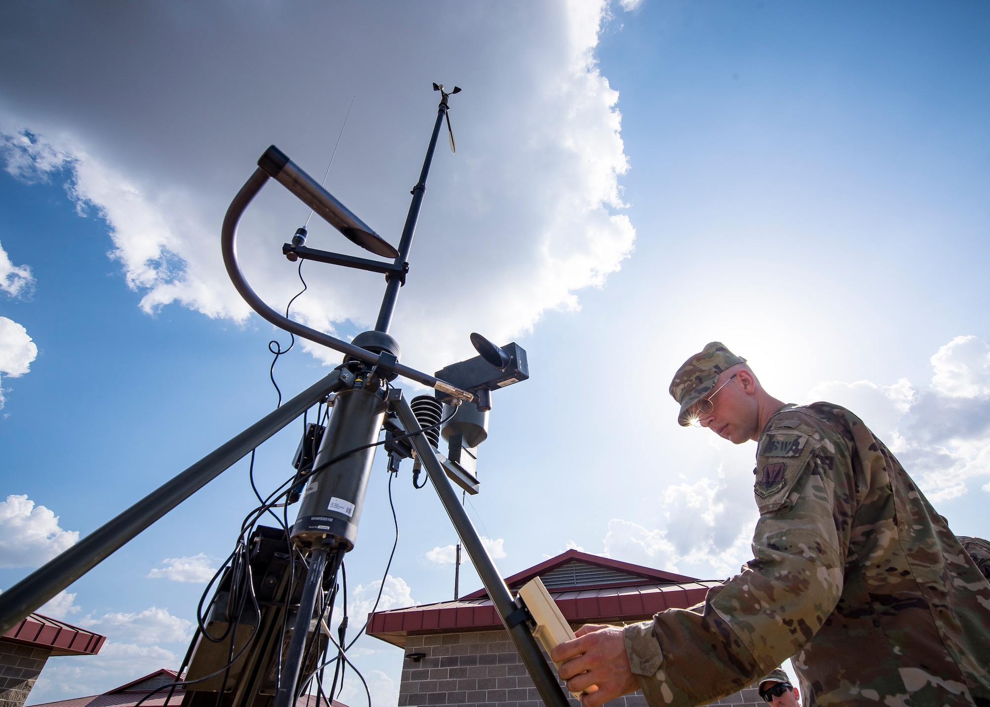 A Staff Weather Officer from the 3d Weather Squadron (WS) operates a tactical meteorological observing system during a certification field exercise (CFX), July 31, 2019, at Camp Bowie Training Center, Texas. The CFX was designed to evaluate the squadron’s overall tactical ability and readiness to provide the U.S. Army with full spectrum environmental support to the Joint Task Force (JTF) fight. While deployed, the Army relies on the 3d WS to provide them with current ground weather reports. These reports are then employed by commanders on the ground as they plan the best tactics and approaches to accomplish the mission. (U.S. Air Force photo by Airman 1st Class Eugene Oliver)