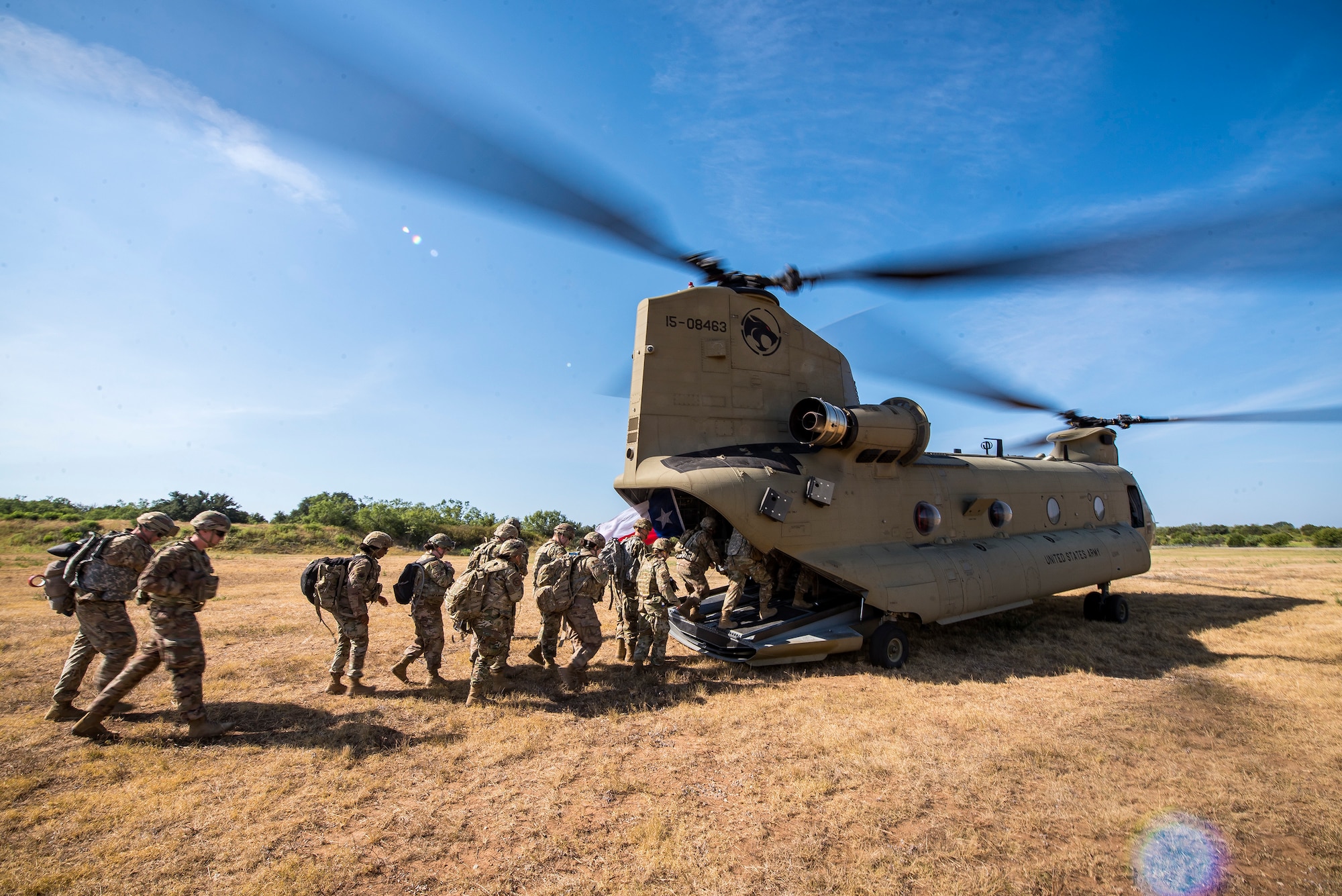 Airmen from the 3d Weather Squadron (WS) enter a CH47-Chinook following a certification field exercise (CFX), August 2, 2019, at Camp Bowie Training Center, Texas. The CFX was designed to evaluate the squadron’s overall tactical ability and readiness to provide the U.S. Army with full spectrum environmental support to the Joint Task Force (JTF) fight. While deployed, the Army relies on the 3d WS to provide them with current ground weather reports. These reports are then employed by commanders on the ground as they plan the best tactics and approaches to accomplish the mission. (U.S. Air Force photo by Airman 1st Class Eugene Oliver)