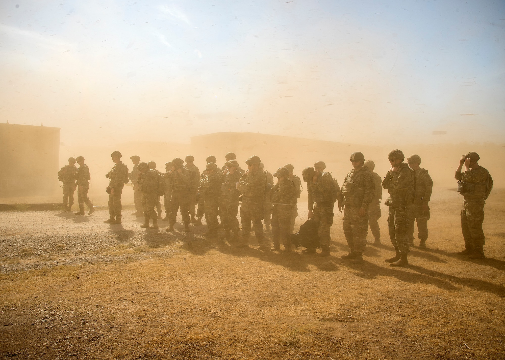 Staff Weather Officers from the 3d Weather Squadron (WS) wait to board a CH47-Chinook following a certification field exercise (CFX), August 2, 2019, at Camp Bowie Training Center, Texas. The CFX was designed to evaluate the squadron’s overall tactical ability and readiness to provide the U.S. Army with full spectrum environmental support to the Joint Task Force (JTF) fight. (U.S. Air Force photo by Airman 1st Class Eugene Oliver)