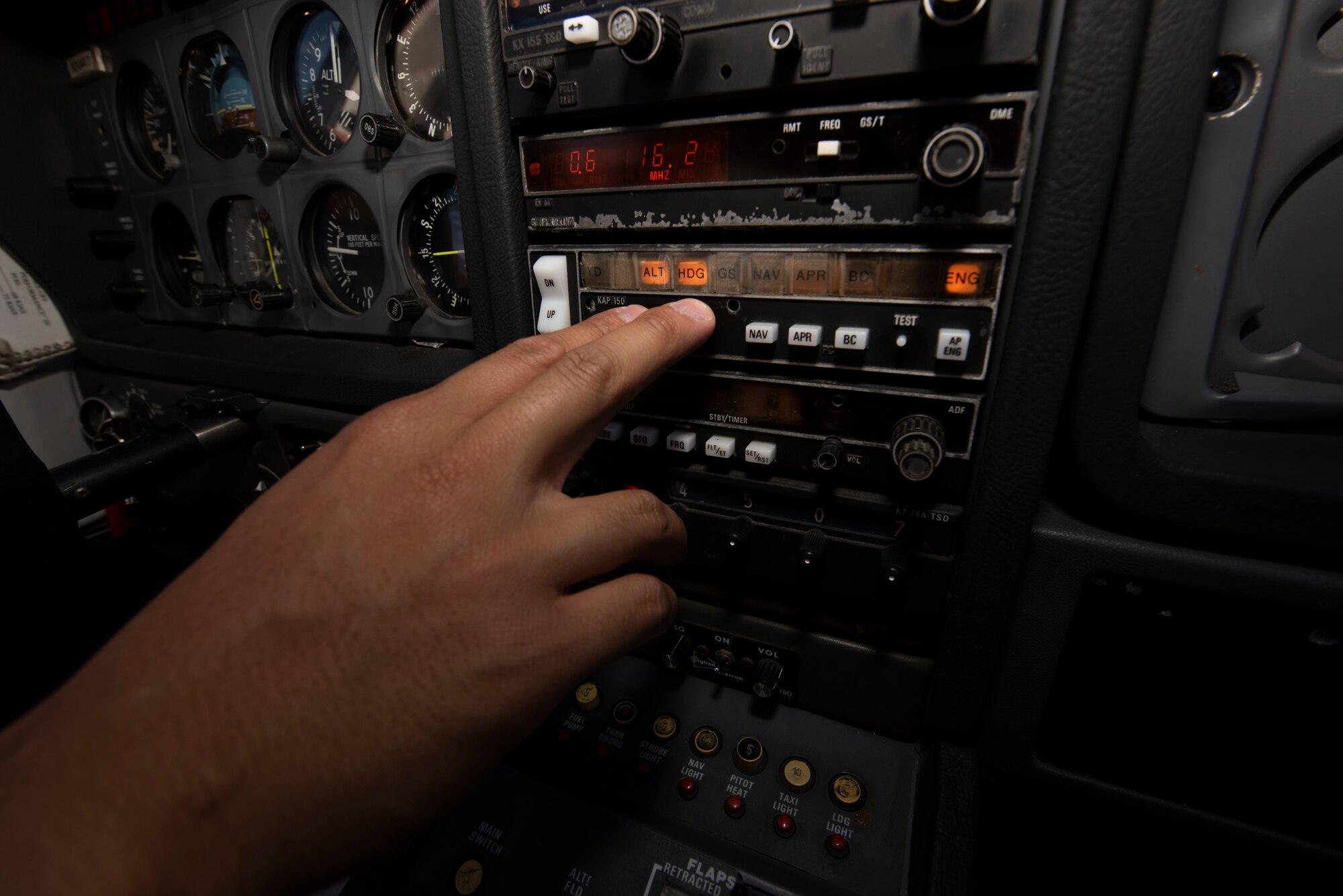 U.S. Air Force Tech. Sgt. Ron, 860th Aircraft Maintenance Squadron flight line expediter, makes an adjustment at the controls of a Socata Trinidad TB-20 July 27, 2019, during a flight over the San Francisco Bay Area. Ron has accumulated more than 250 flying hours and completed Air Force remote pilot aircraft training July 12. (U.S. Air Force photo by Tech. Sgt. James Hodgman)