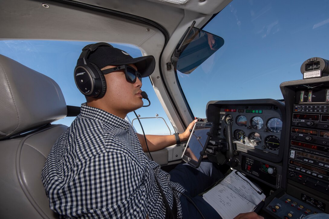 U.S. Air Force Tech. Sgt. Ron, 860th Aircraft Maintenance Squadron flight line expediter, mans the controls of a Socata Trinidad TB-20 July 27, 2019, during a flight over the San Francisco Bay Area. Ron has accumulated more than 250 flying hours and completed Air Force remote pilot aircraft training July 12. (U.S. Air Force photo by Tech. Sgt. James Hodgman)