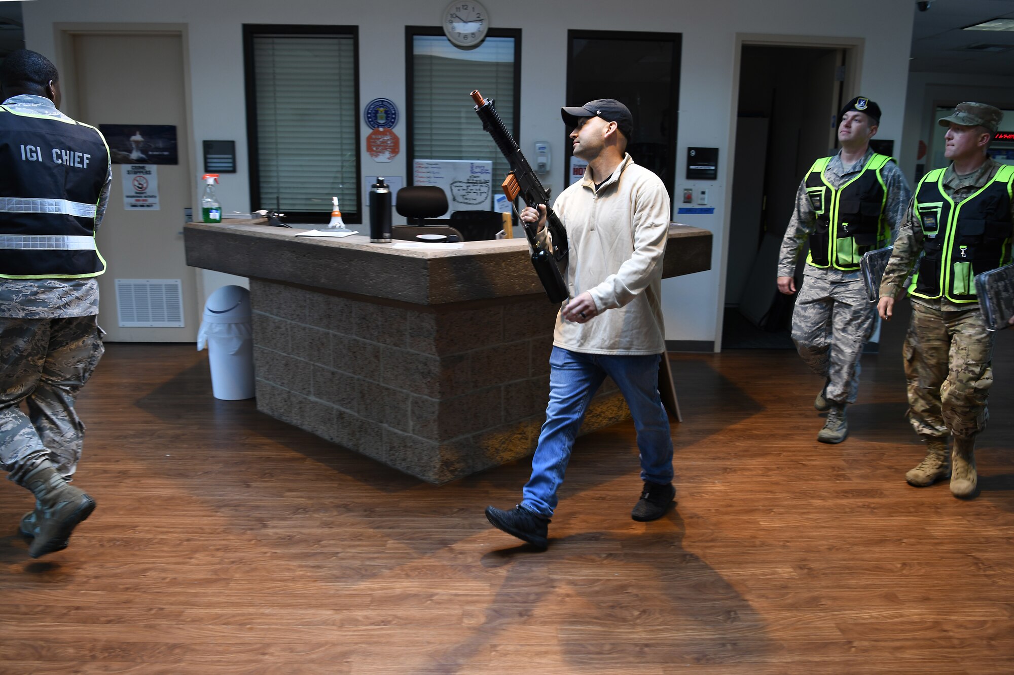 Base members participate in an active shooter exercise Aug. 7, 2019, at Vandenberg Air Force Base, Calif.