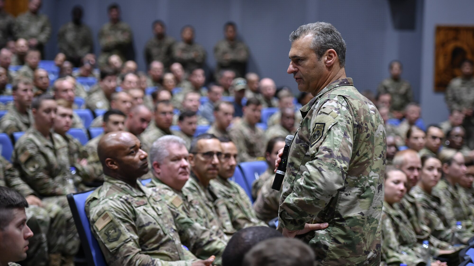 U.S. Air Force Lt. Gen. Joseph T. Guastella, U.S. Air Forces Central Command commander, addresses base personnel about their contribution to the mission and resiliency during a visit to Ali Al Salem Air Base, Kuwait, Aug. 8, 2019. AFCENT leadership visited the 386th Air Expeditionary Wing to discuss how each Airman's role contributes to the mission, to take questions and address concerns. (U.S. Air Force photo by Staff Sgt. Mozer O. Da Cunha)
