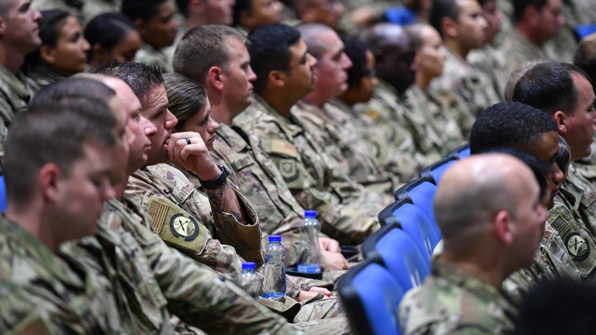 U.S. Airmen assigned to the 386th Air Expeditionary Wing listen as Lt. Gen. Joseph T. Guastella, U.S. Air Forces Central Command commander, speaks during his visit to Ali Al Salem Air Base, Kuwait, Aug. 8, 2019. Topics included a discussion about the sacrifices Airmen make and how each role is important in supporting the mission. (U.S. Air Force photo by Staff Sgt. Mozer O. Da Cunha)