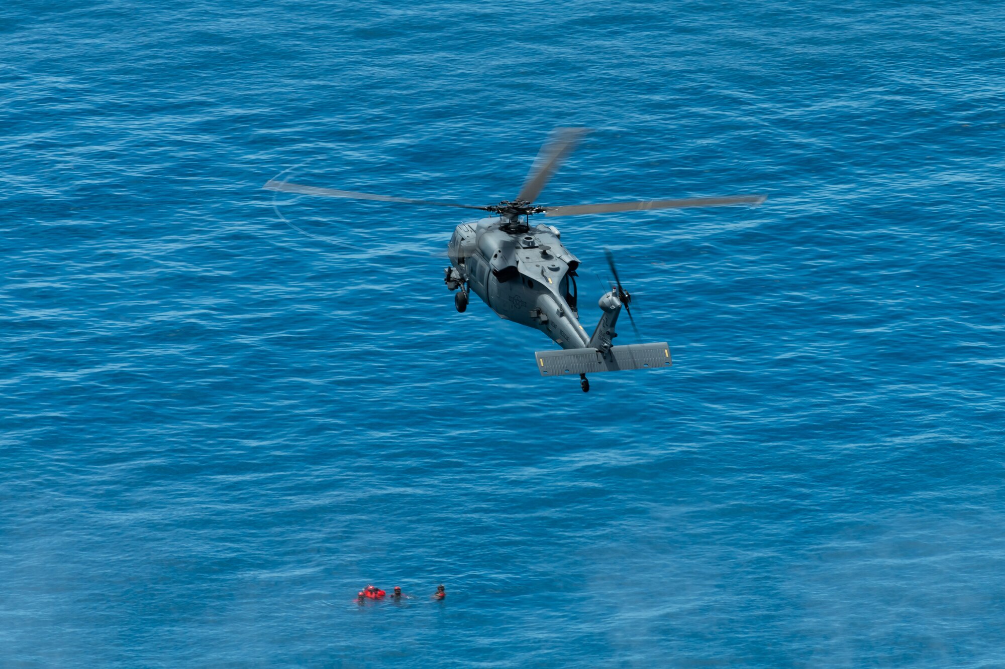 An HH-60G Pave Hawk from the 33rd Rescue Squadron flies during a training exercise, July 23, 2019, out of Kadena Air Base, Japan. Members of the 33rd and 31st Rescue Squadrons from Kadena AB train and work together to provide support for combat rescue and disaster relief. (U.S. Air Force photo by Airman 1st Class Matthew Seefeldt)