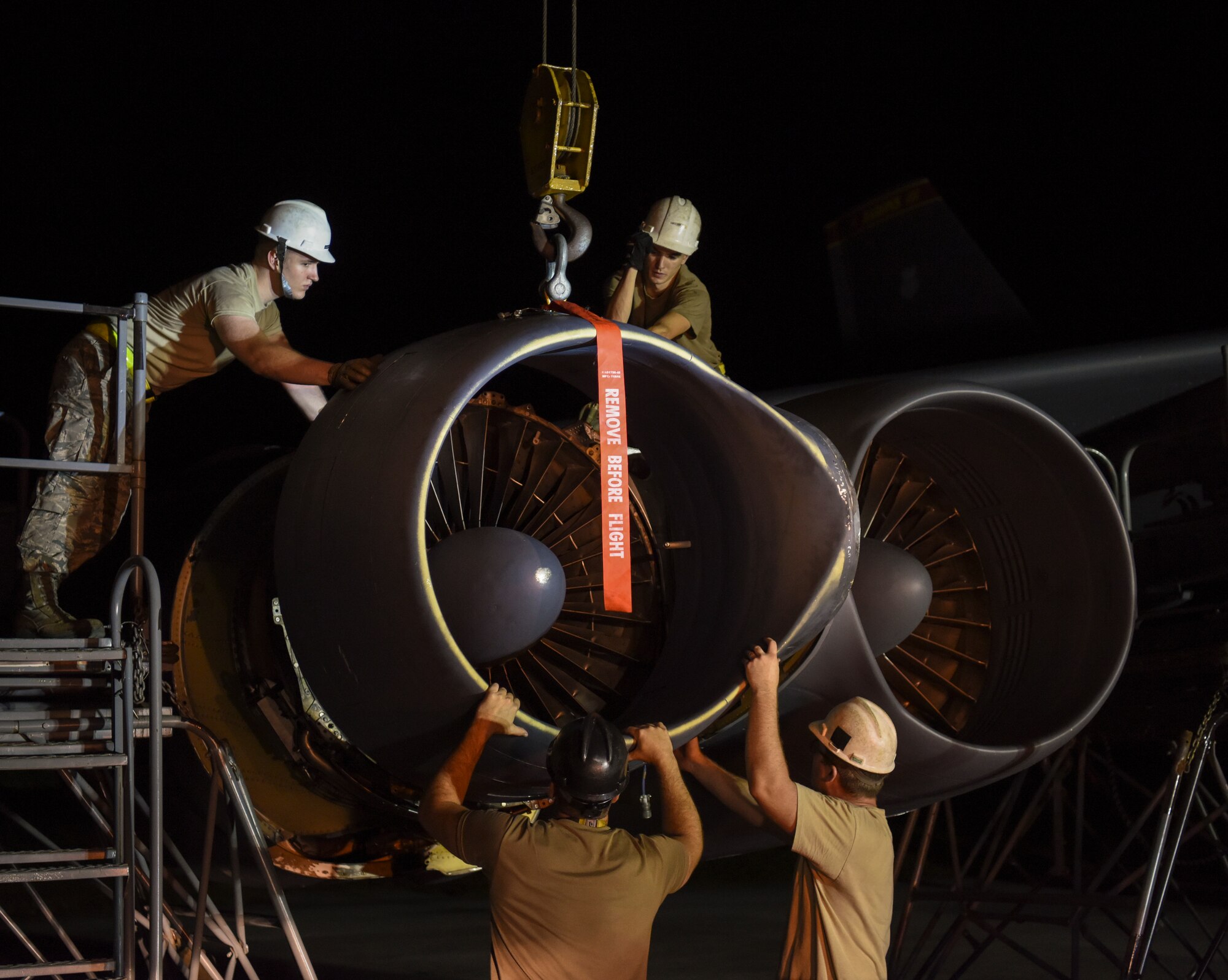 36th Expeditionary Aircraft Maintenance Squadron Airmen install a ring cowl on a 69th Expeditionary Bomb Squadron B-52 Stratofortress  on Andersen Air Force Base, Guam, Aug. 7, 2019.