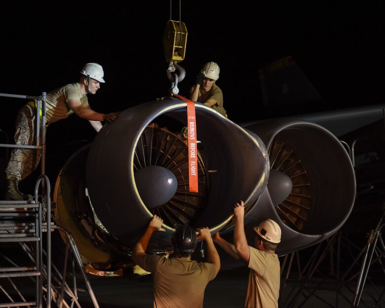 36th Expeditionary Aircraft Maintenance Squadron Airmen install a ring cowl on a 69th Expeditionary Bomb Squadron B-52 Stratofortress  on Andersen Air Force Base, Guam, Aug. 7, 2019.
