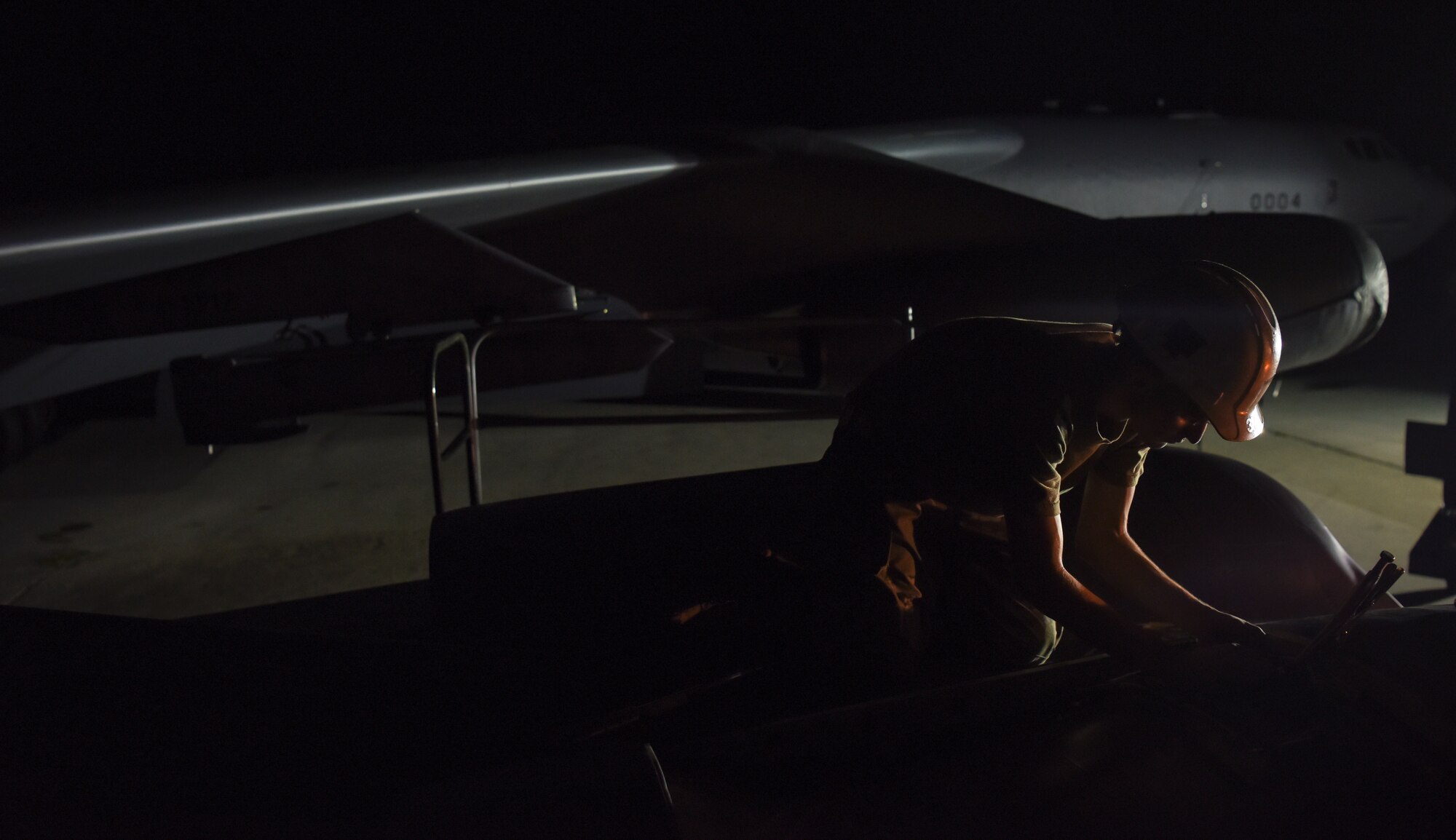 Senior Airman Dillain Lapolice, 36th Expeditionary Aircraft Maintenance Squadron aerospace propulsion journeyman, installs a ring cowl on a 69th Expeditionary Bomb Squadron B-52 Stratofortress on Andersen Air Force Base, Guam, Aug. 7, 2019.