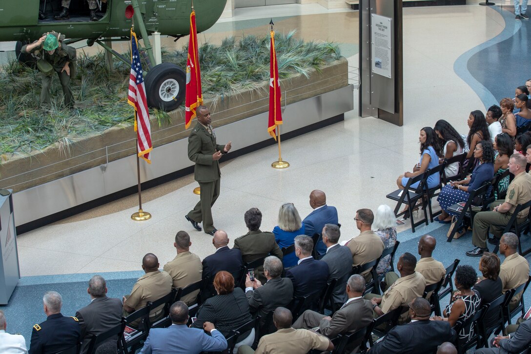 Melvin G. Carter speaks during a ceremony in which he was promoted to brigadier general in the United States Marine Corps at the National Museum of the Marine Corps in Triangle, Virginia, August 9, 2019. Carter grew up in York, Pennsylvania and enlisted in the Marine Corps in 1985. He was awarded a NROTC Scholarship to attend Morehouse College in Atlanta, Georgia and was commissioned as a second lieutenant in the United States Marine Corps upon graduating in 1992. During most of 34 years of service, Carter has served as Marine Air Ground Task Force Intelligence Officer and has completed multiple tours overseas in combat zones to include Operation Joint Endeavor in Bosnia and Herzegovina, Operation Anaconda in Afghanistan, Operations Balkan Justice and Restore Freedom, and Operation Iraqi Freedom. He will now serve as the Director of Intelligence, Headquarters Marine Corps. (U.S. Marine Corps photo by Lance Cpl. Mitchell Collyer)
