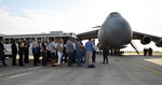 Employers of 433rd Airlift Wing Reserve Citizen Airmen prepare to board a C-5M Super Galaxy at Joint Base San Antonio-Lackland Aug. 3. They were invited to take an Employer Support of Guard and Reserve Bosslift tour to Tinker Air Force Base, Oklahoma.