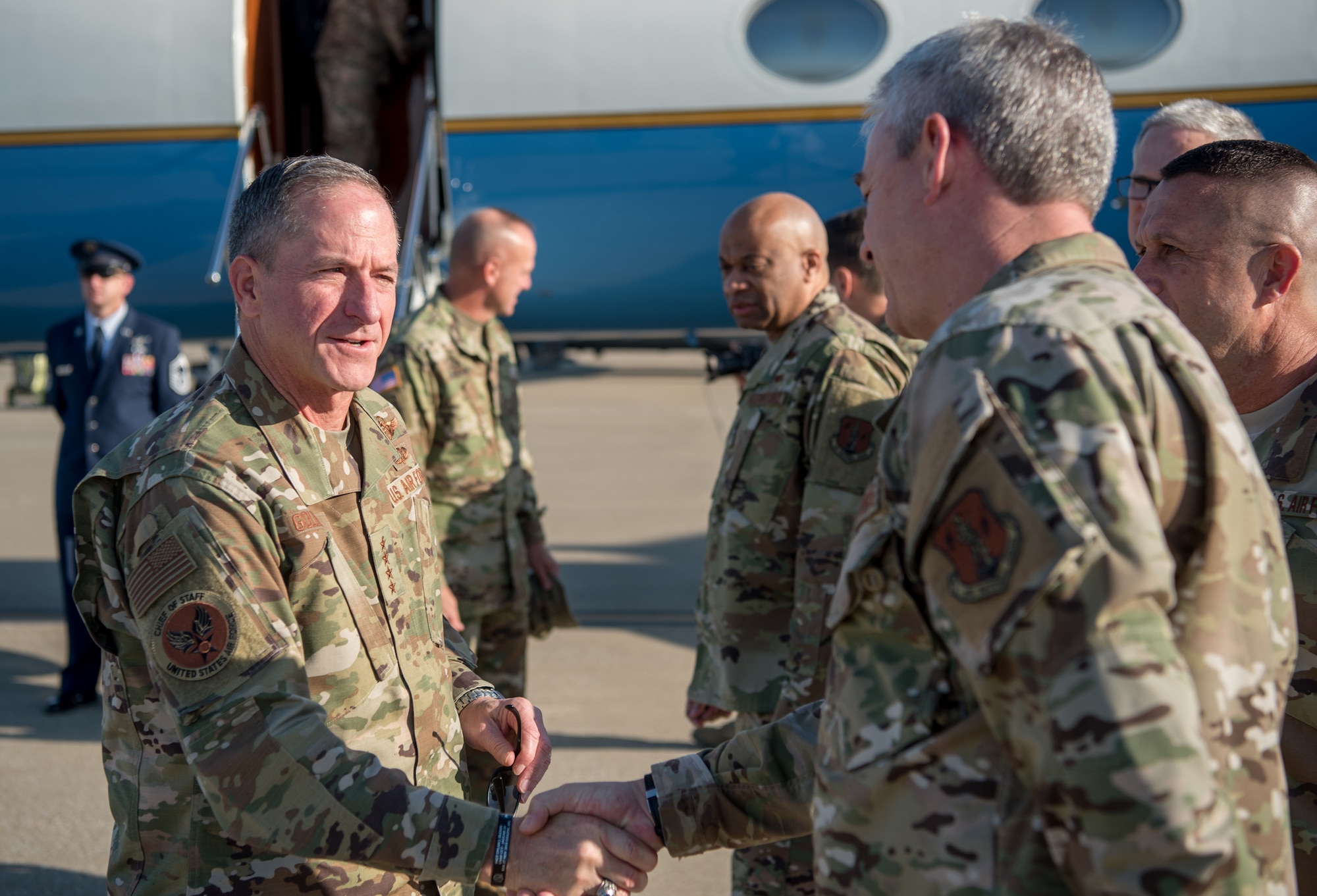 Air Force Chief of Staff Gen. David L. Goldfein (left) greets Chief Master Sgt. Shane Lagrone, 123rd Airlift Wing command chief, upon arrival at the Kentucky Air National Guard Base in Louisville, Ky., Aug. 10, 2019. Goldfein toured various work centers, learning about the unique mission sets of the 123rd Airlift Wing. (U.S. Air National Guard photo by Staff Sgt. Joshua Horton)