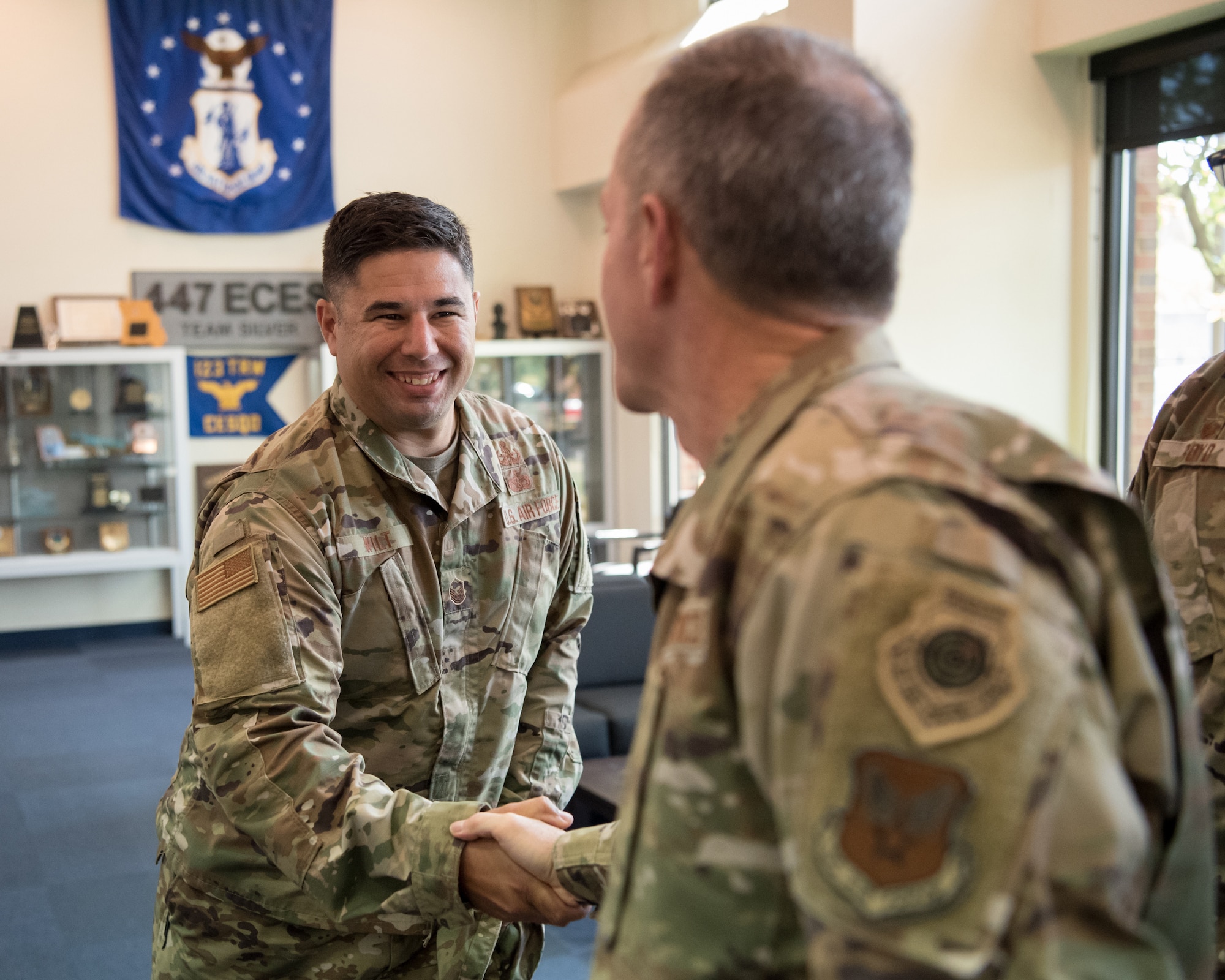 Air Force Chief of Staff Gen. David L. Goldfein greets Master Sgt. Matthew Wilt, a 123rd Explosive Ordnance Disposal Flight Airman, during a tour of the Kentucky Air National Guard Base in Louisville, Ky., Aug. 10, 2019. In addition to C-130 airlift and EOD, the base is home to a special tactics squadron and the only contingency response group in the Air National Guard. (U.S. Air National Guard photo by Staff Sgt. Joshua Horton)