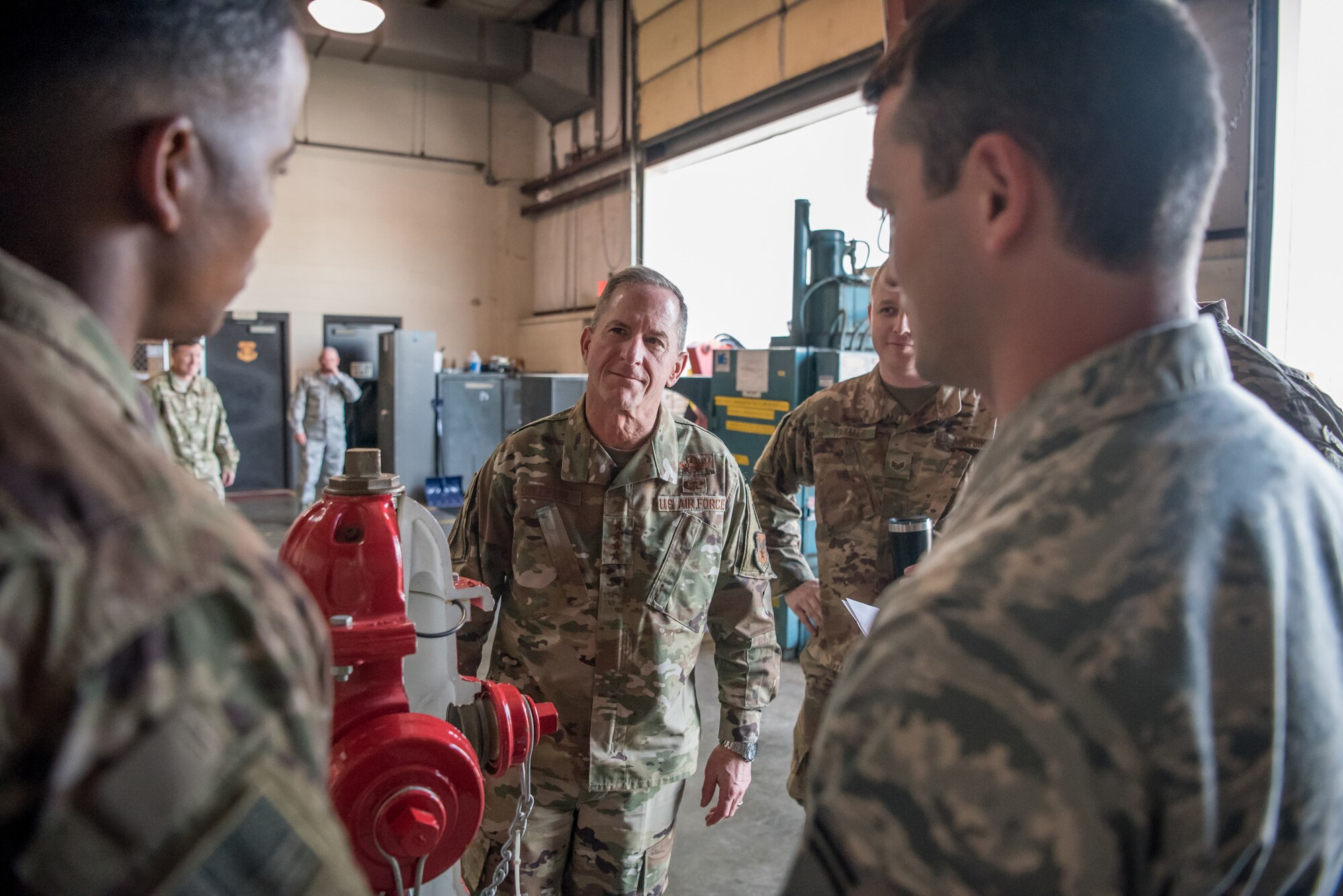 Air Force Chief of Staff Gen. David L. Goldfein speaks with Airmen as he tours the Kentucky Air National Guard base in Louisville, Ky., Aug. 10, 2019. During his visit, Goldfein saw various work centers, learning about the unique mission sets of the 123rd Airlift Wing. (U.S. Air National Guard photo by Staff Sgt. Joshua Horton)