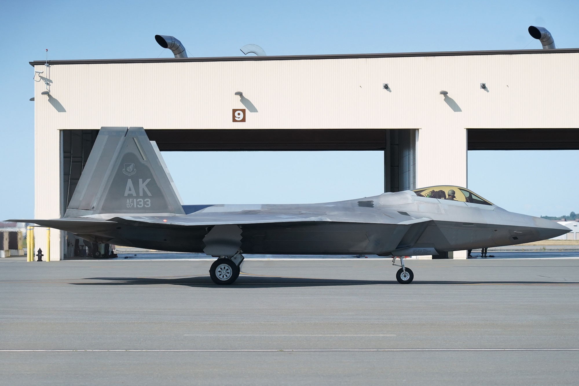 An F-22 Raptor taxis after landing so Airmen assigned to the 673d Logistics Readiness Squadron can refuel it on Joint Base Elmendorf-Richardson, Alaska, Aug. 9, 2019.  Fuels specialists manage every aspect of the refueling every aircraft on the flight line and are responsible for operating the vehicles, equipment and storage facilities that are essential to refueling operations while ensuring compliance with all safety regulations while handling these volatile liquids.