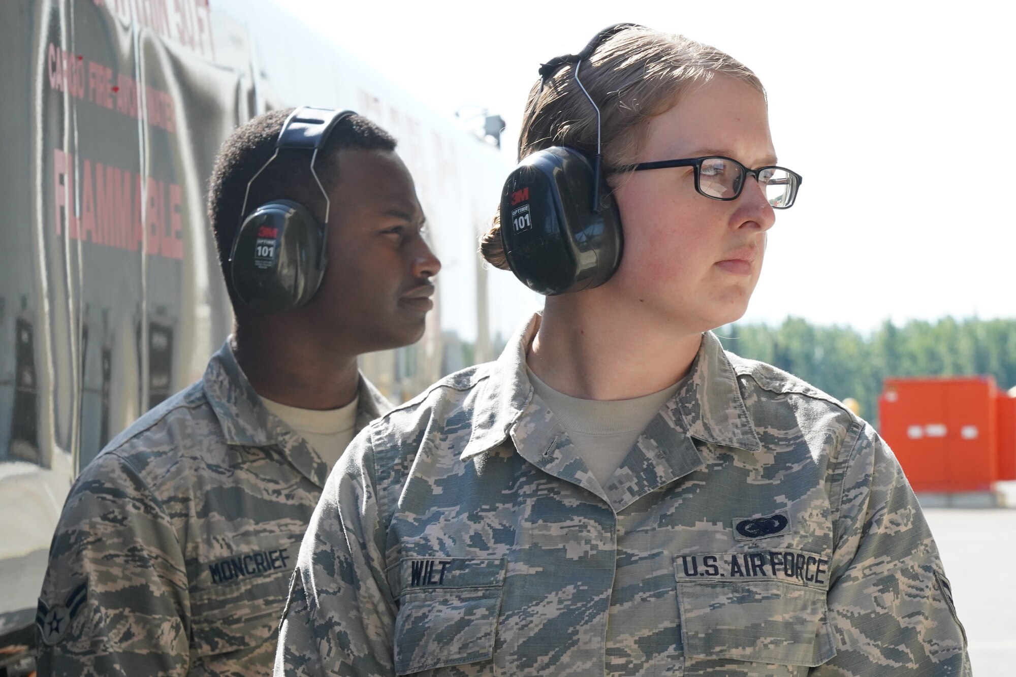 Senior Airman Jessica Wilt, right, and Airman 1st Class Anthony Moncrief, both assigned to the 673d Logistics Readiness Squadron, refuel an F-22 Raptor of the 525th Fighter Squadron (the Bulldogs) on Joint Base Elmendorf-Richardson, Alaska, Aug. 9, 2019.  Fuels specialists manage every aspect of the refueling every aircraft on the flight line and are responsible for operating the vehicles, equipment and storage facilities that are essential to refueling operations while ensuring compliance with all safety regulations while handling these volatile liquids.
