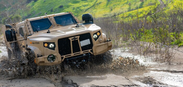 A Joint Light Tactical Vehicle displays its overall capabilities during a live demonstration at the School of Infantry West, Marine Corps Base Camp Pendleton, California, Feb. 27, 2019. The JLTV consists of multiple platforms capable of completing a variety of missions while providing increased protection and mobility for personnel across the Marine Corps.