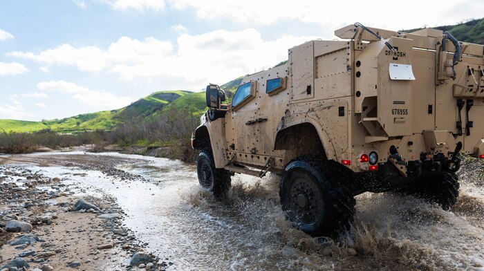 A Joint Light Tactical Vehicle displays its overall capabilities during a live demonstration at the School of Infantry West, Marine Corps Base Camp Pendleton, California, Feb. 27, 2019. The JLTV consists of multiple platforms capable of completing a variety of missions while providing increased protection and mobility for personnel across the Marine Corps.