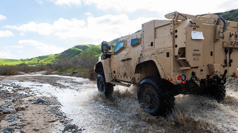 A Joint Light Tactical Vehicle displays its overall capabilities during a live demonstration at the School of Infantry West, Marine Corps Base Camp Pendleton, California, Feb. 27, 2019. The JLTV consists of multiple platforms capable of completing a variety of missions while providing increased protection and mobility for personnel across the Marine Corps.
