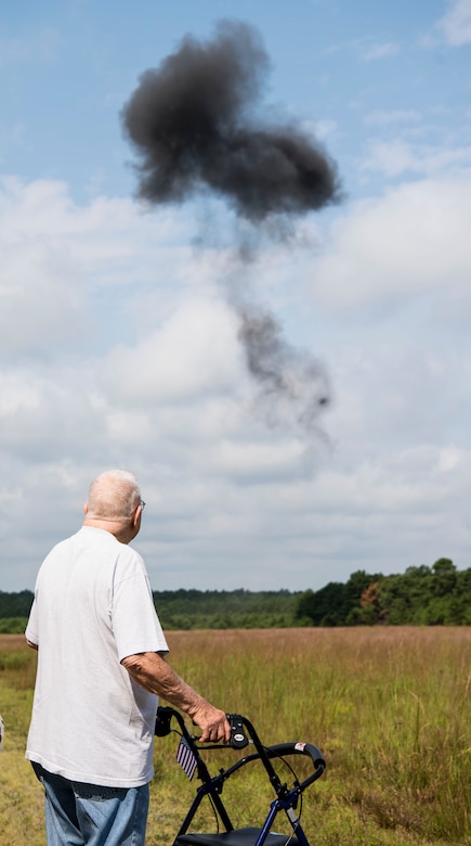 John “Jack” McCarthy, retired U.S. Air Force Explosive Ordnance Disposal technician, watches the mushroom cloud of a detonation on Joint Base McGuire-Dix-Lakehurst, New Jersey, Aug. 7, 2019. McCarthy was given a tour of the 87th Civil Engineer Squadron EOD unit and watched a controlled detonation demonstration on the EOD proficiency range. (U.S. Air Force photo by Airman 1st Class Ariel Owings)